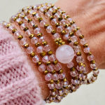 Sautoir Vega en perles à facettes transparentes de couleur rose
